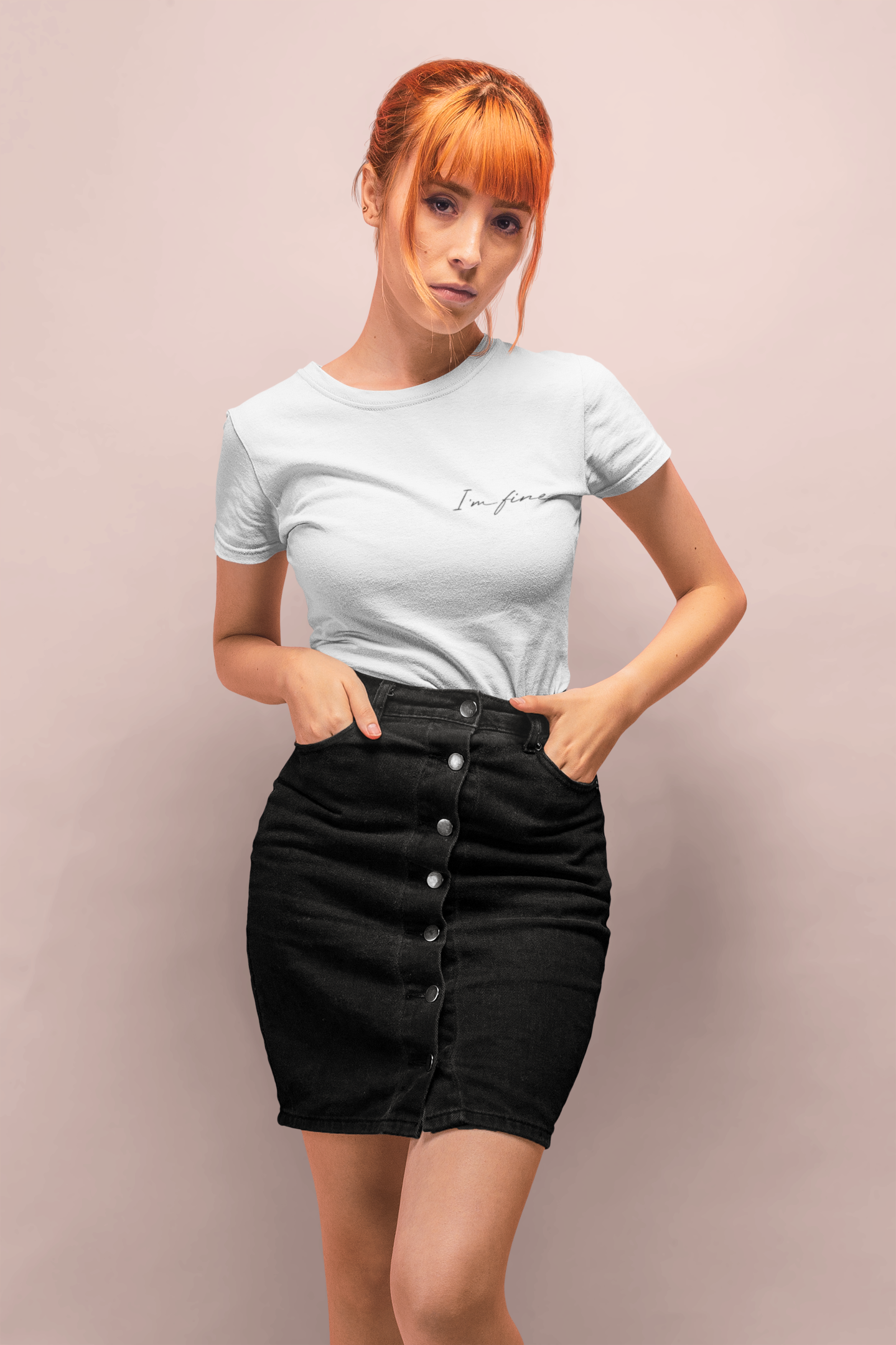 I'm Fine TShirt on red head woman in black mini skirt against pink wall