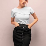 I'm Fine TShirt on red head woman in black mini skirt against pink wall